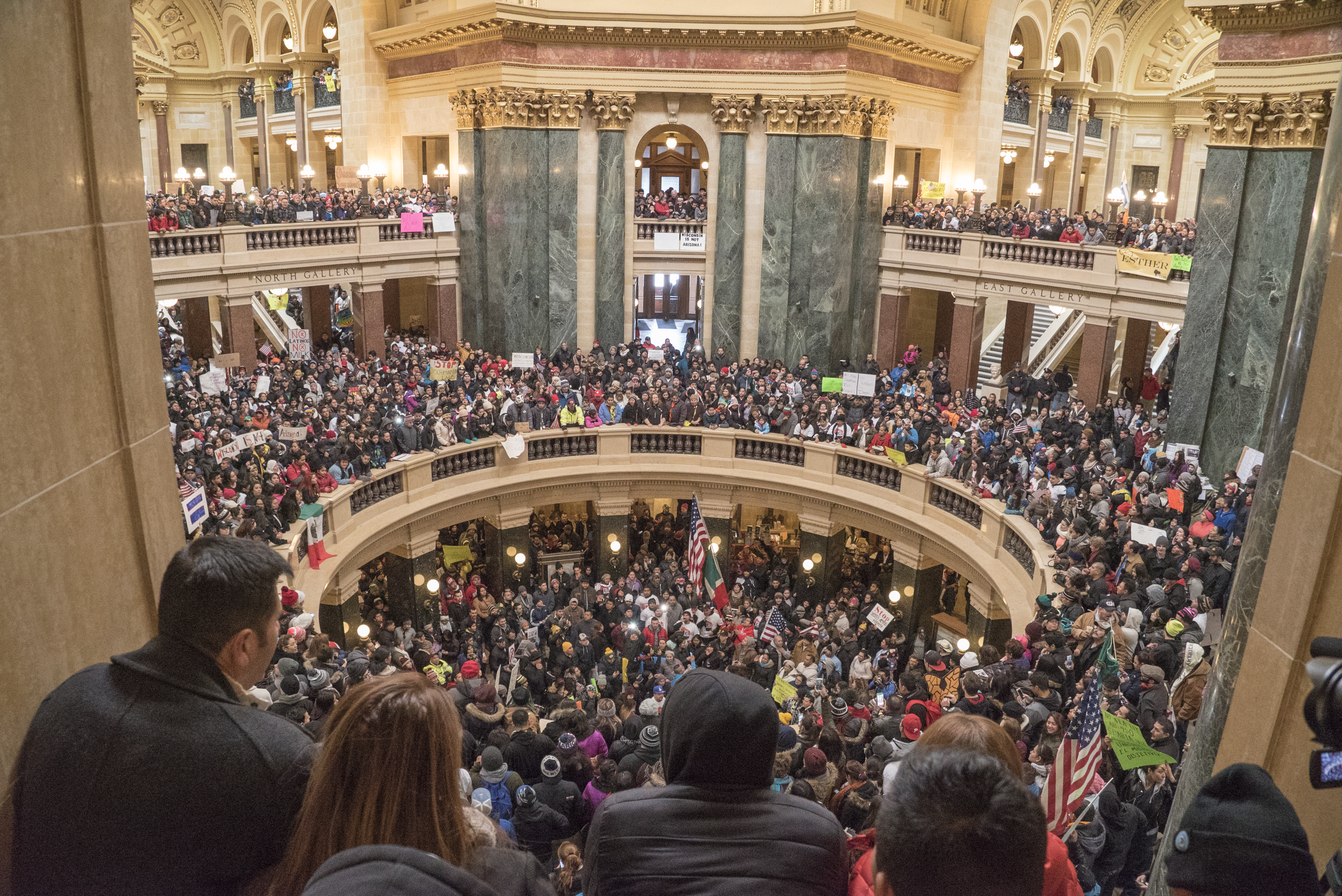 Thousands of people crowding the State Capitol rotunda